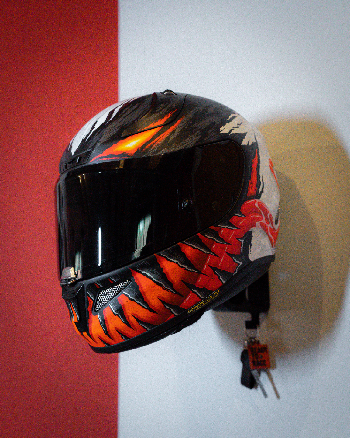 Helmet holder/keychain holder