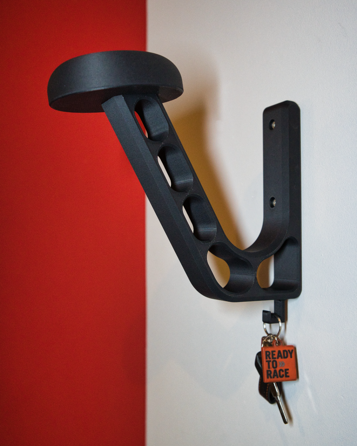 Helmet holder/keychain holder