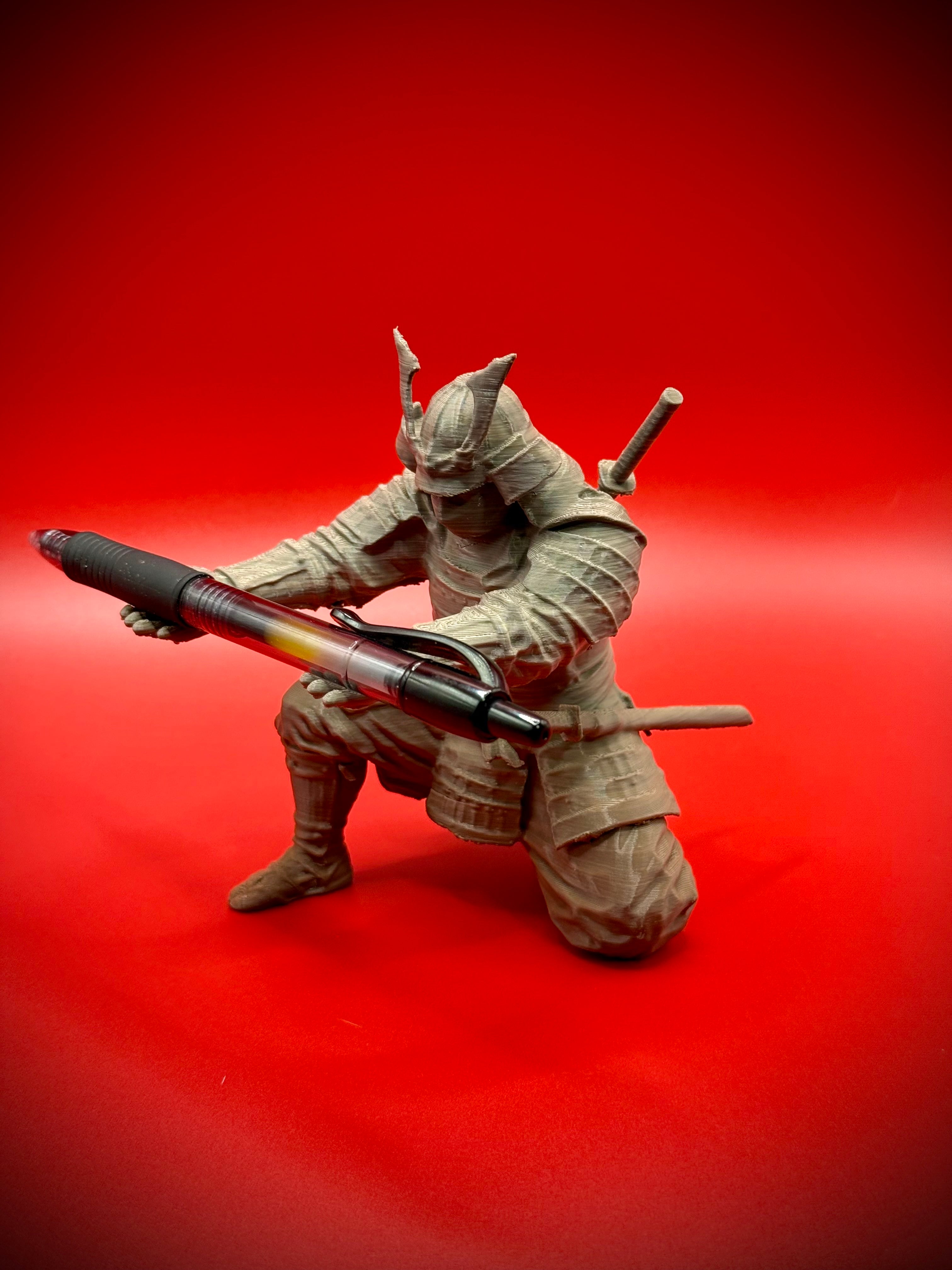 Samurai pen holder