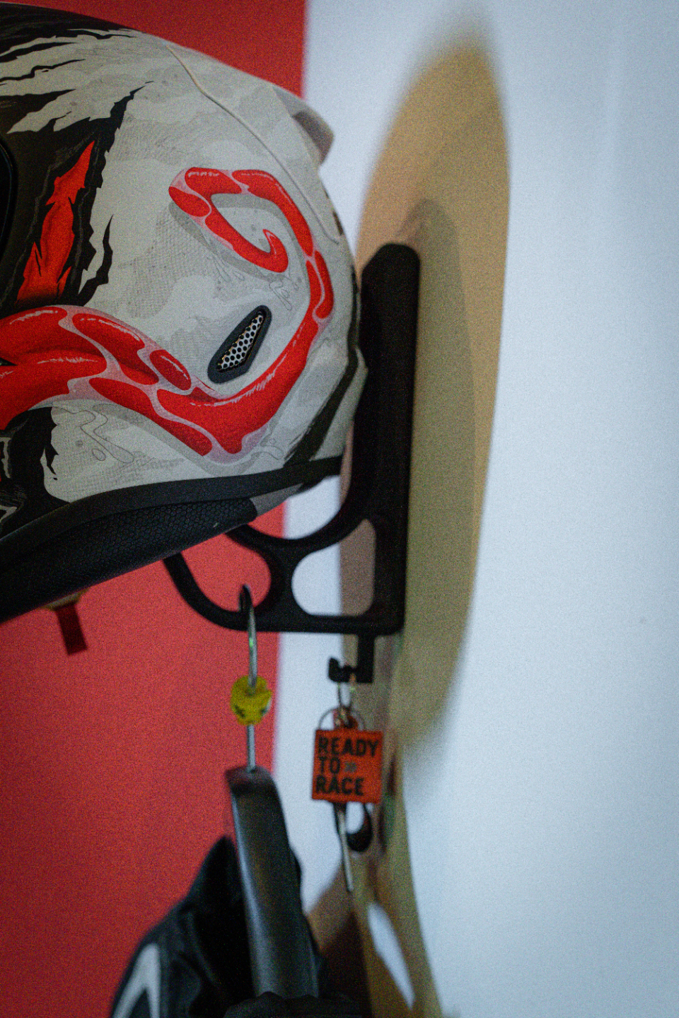 Helmet holder/keychain holder